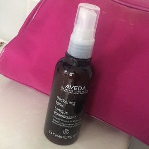 Aveda thickening tonic.  Never used.